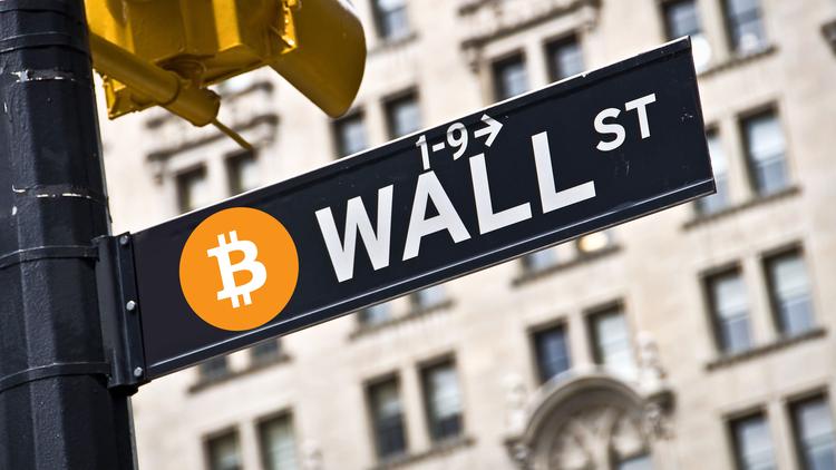Picture of a Wall Street street sign with a bitcoin logo next to it