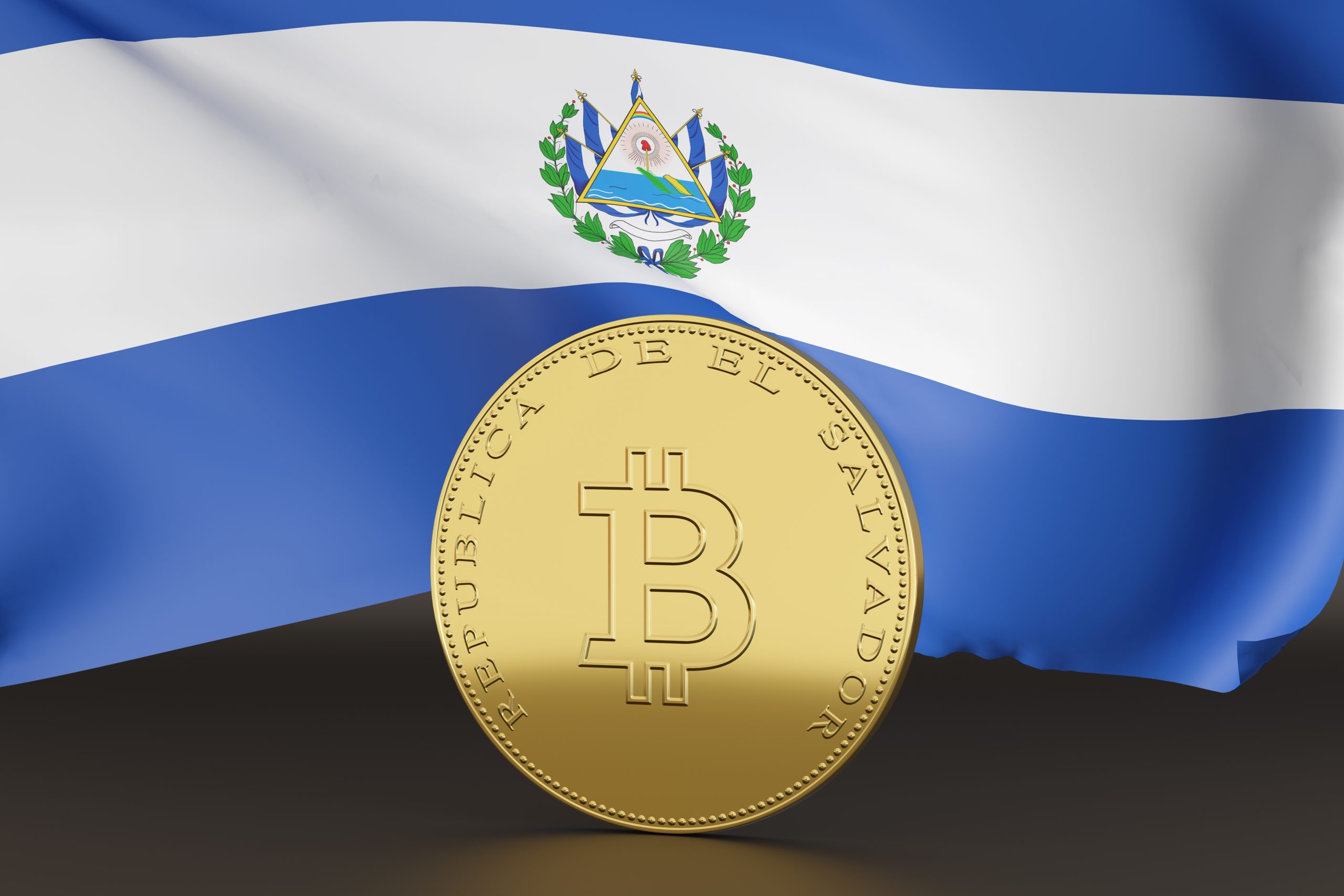 Picture of a bitcoin in front a flag of El Salvador