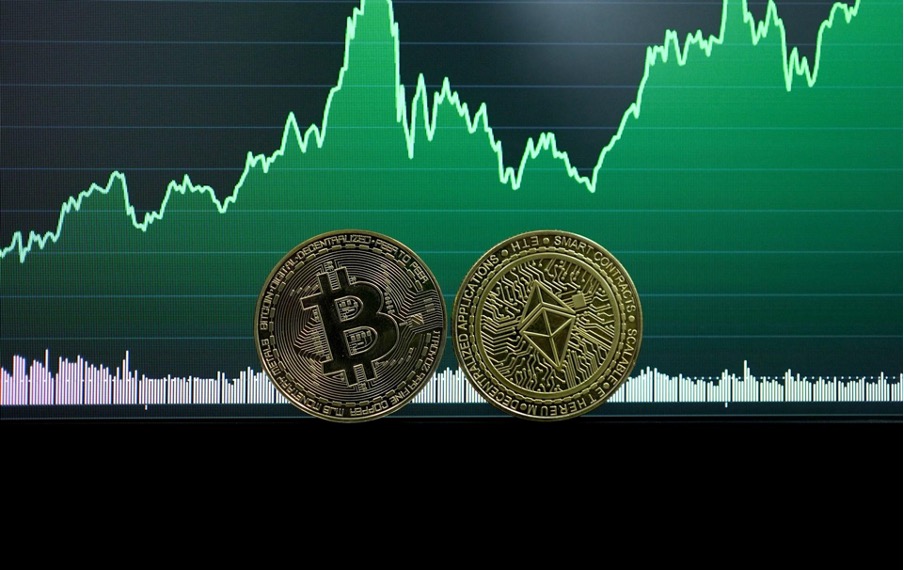 dummy bitcoin ethereum coins infront of bullish graph